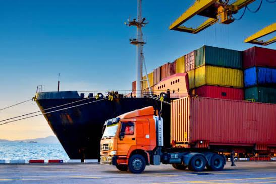 ALT truck loading containers at the dockside, part of our owned global network