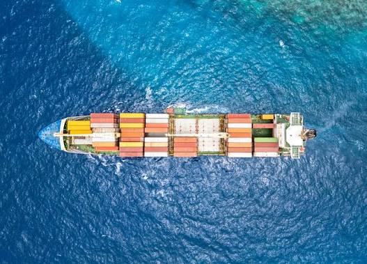 Aerial view of an ALT container ship crossing open ocean